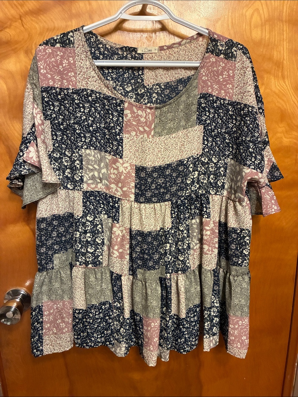 e.LUNA. Size Medium. Ruffle sleeves. Patchwork Floral Peplum Top. Like new.